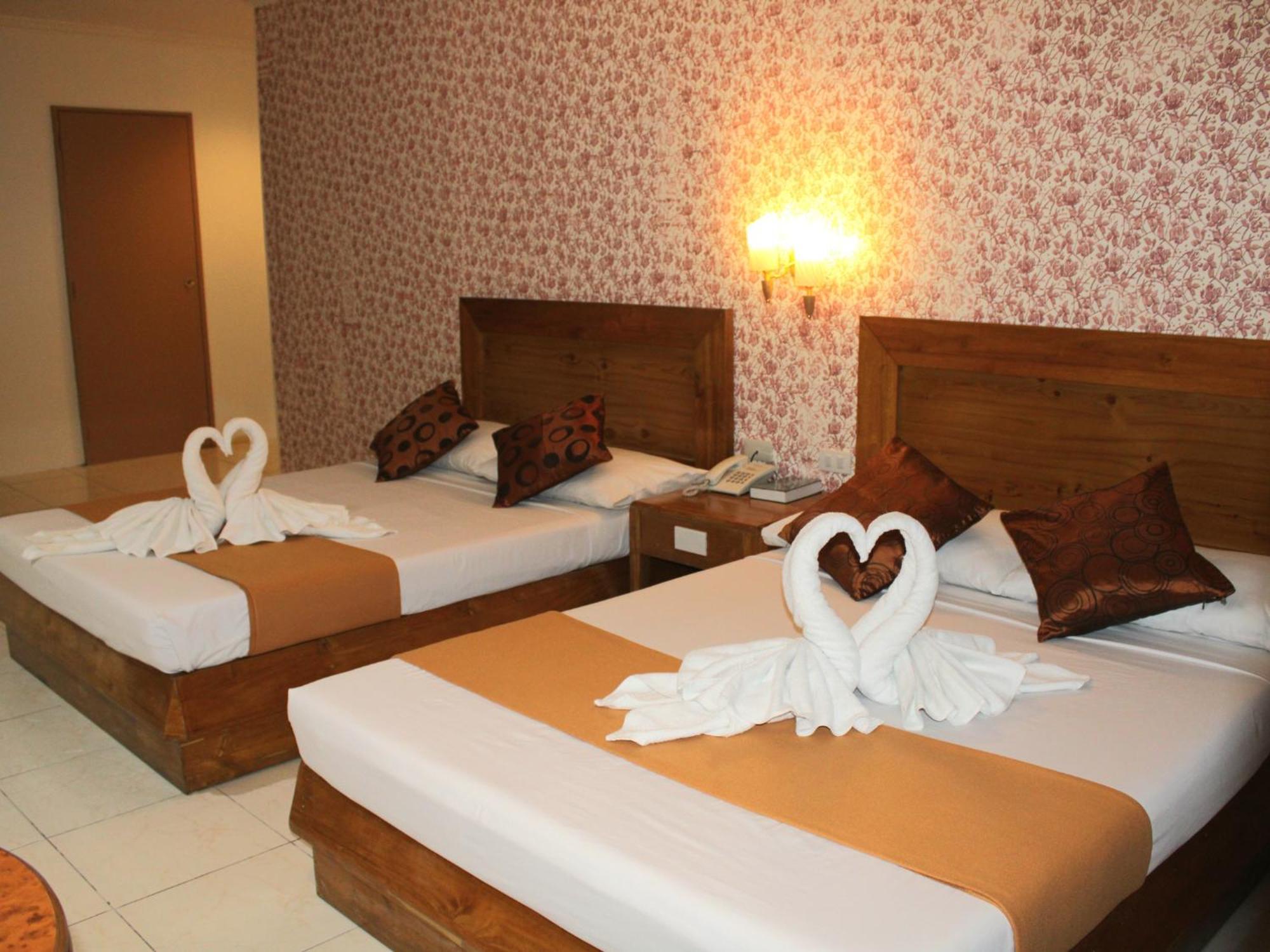 OYO 653 Rosas Garden Hotel Manilla Buitenkant foto